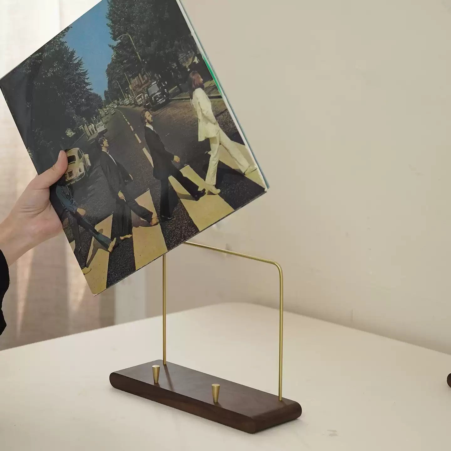 Arvo wooden stand for displaying CD albums