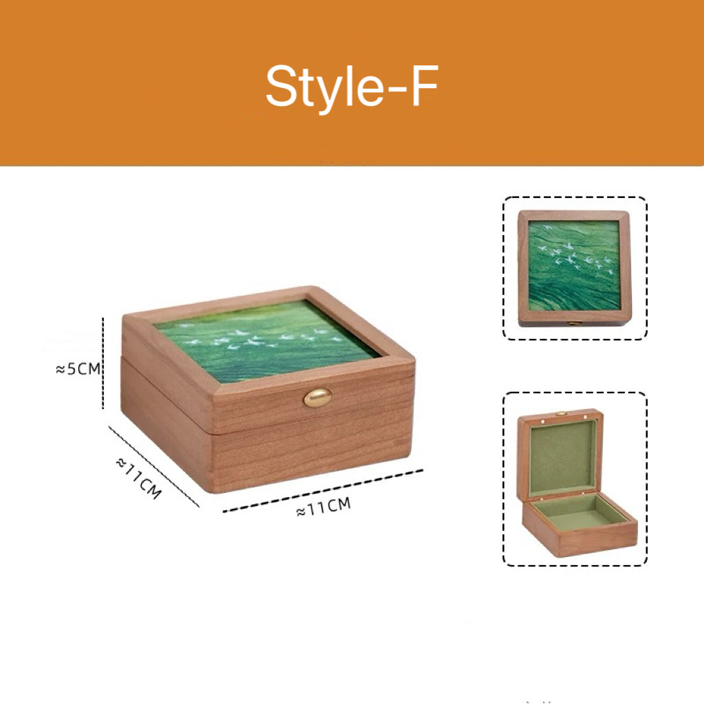 Cherry wood jewelry box showcasing artistic glass panel