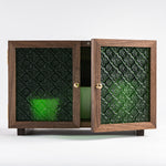 Elegant walnut storage cabinet with decorative green glass doors