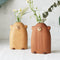 Little Bear Solid Wood Flower Vase on tabletop