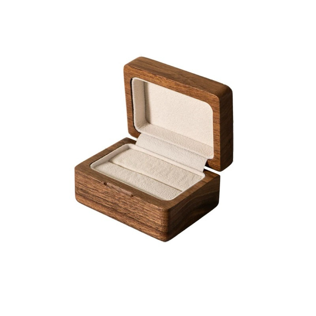 Open Lumina wood box with ring cushion visible