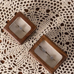 Open box showing interior velvet padding