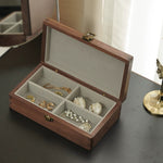 Sleek walnut jewelry storage box designed by Emerald