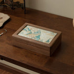 Solara Black Walnut Embroidered Jewelry Box holding earrings