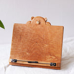 Wooden reading stand with bear design