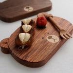 Wooden serving board with bear design