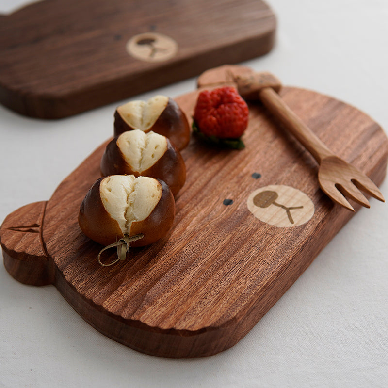 Wooden serving board with bear design