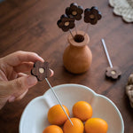 flower shaped black walnut fruit skewers for parties